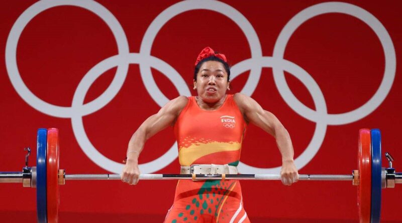 Mirabai Chanu Olympic champion weightlifter by lifting wooden bundles